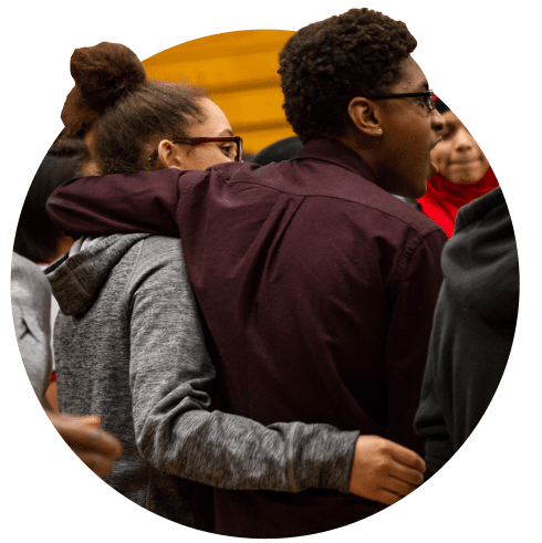 students arm in arm on a respect retreat