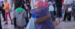 Students hugging at the end of a Kindness Retreat
