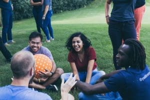 Retreat Staff hanging out outside during our August training.